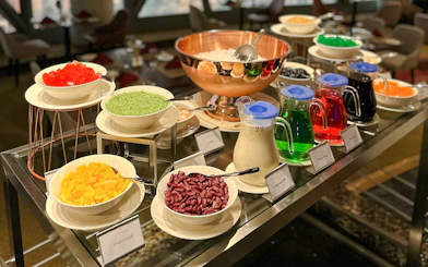 Lunch buffet with assorted desserts and drinks at ORBIT Revolving Dining, KL Tower.