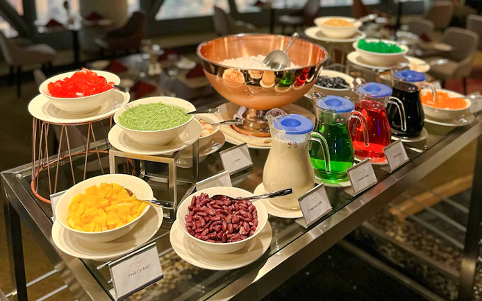 Lunch buffet with assorted desserts and drinks at ORBIT Revolving Dining, KL Tower.
