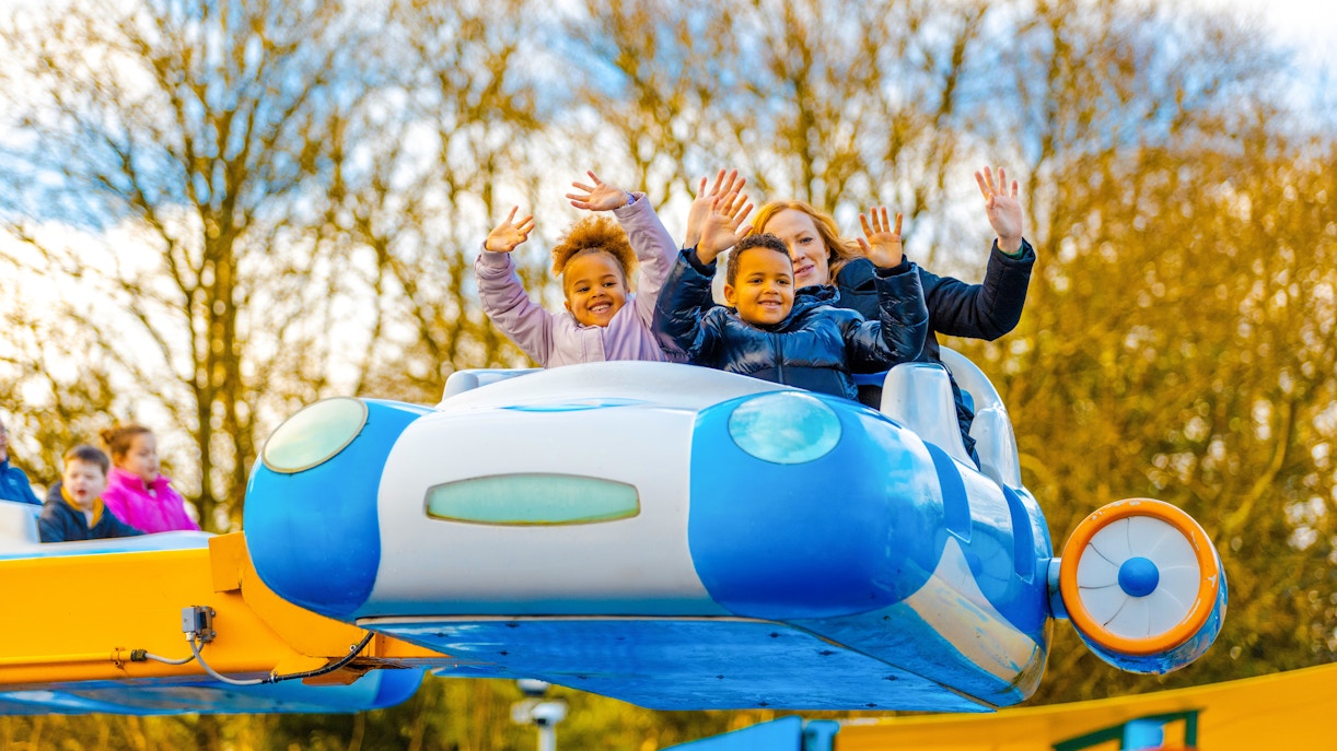 Children enjoying a ride at Alton Towers during Christmas festivities.