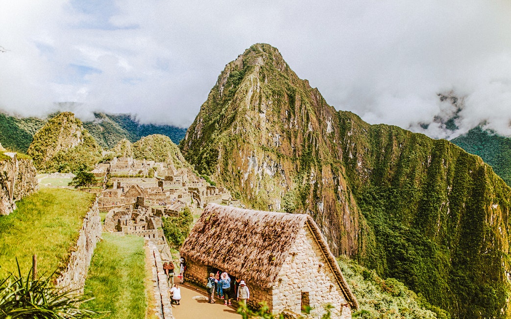 Machu Picchu ruins with Huayna Picchu mountain in the background, Peru.