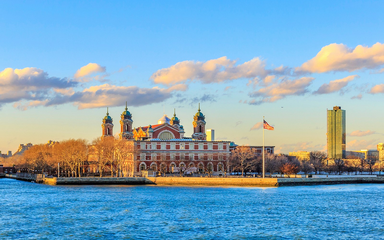 Ellis island immigration museum during sunset cruise