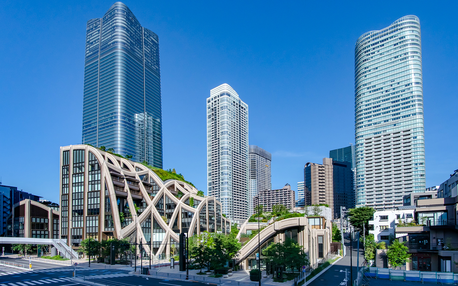 Azabudai Hills skyline with modern skyscrapers and unique architectural design in Tokyo, Japan.