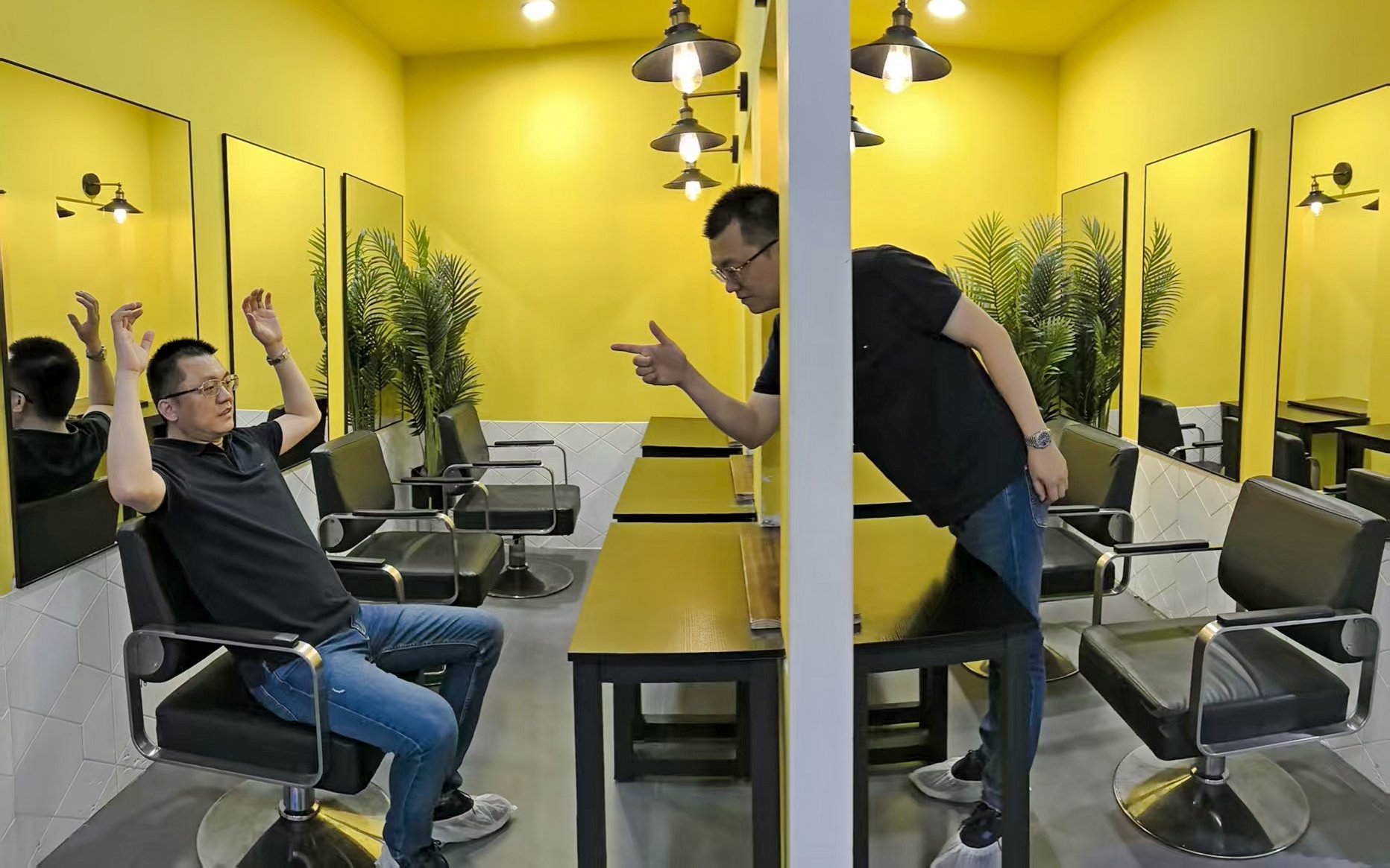 Two people interacting in a mirrored room at Space & Time Cube, Bangkok.