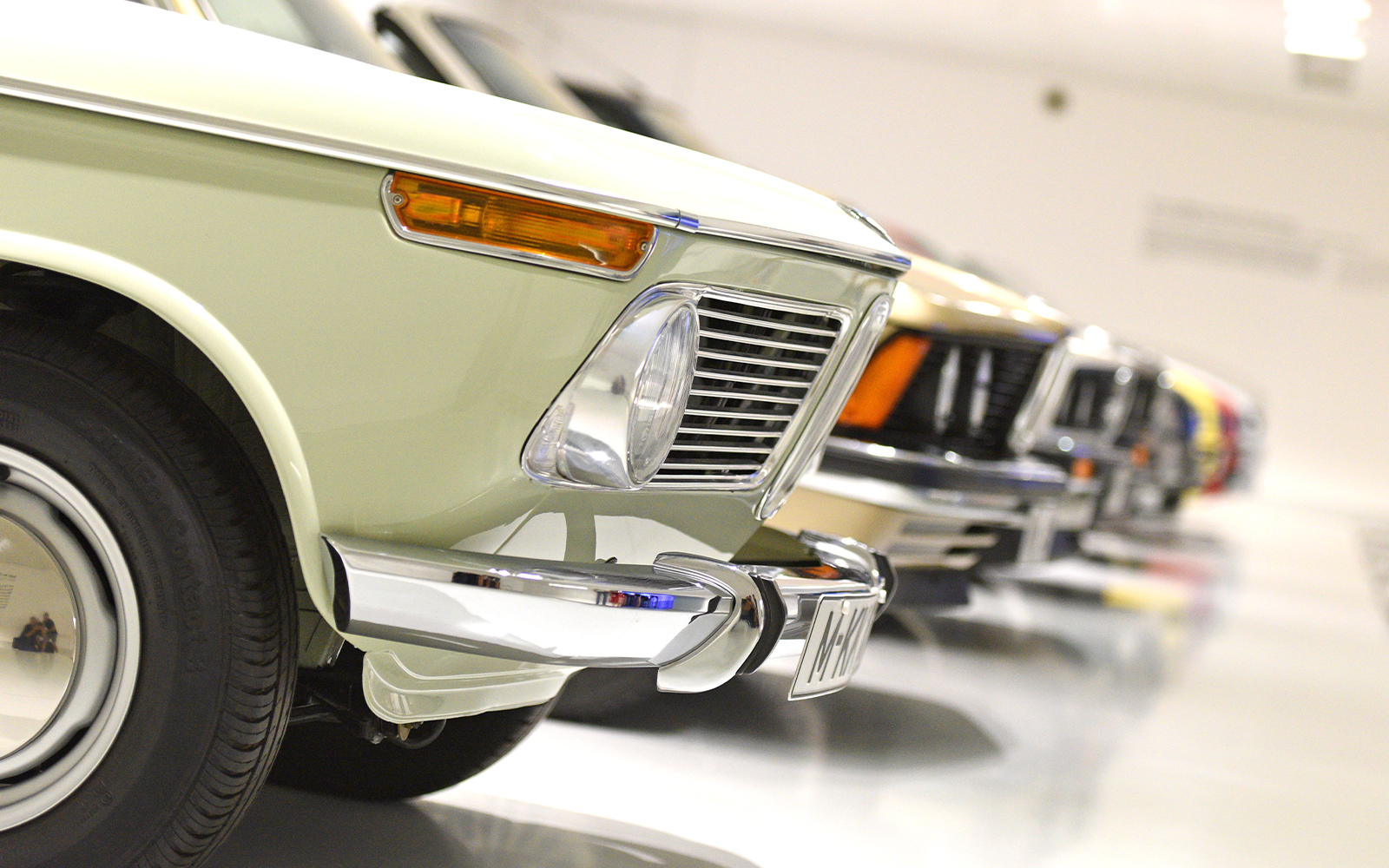 Closeup of vintage BMW cars on display at the BMW Museum.