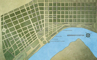 Map of New Orleans streets near the Mississippi River, highlighting landmarks like Jackson Square and Lee Circle.