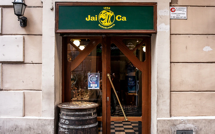 Entrance of Jai Ca restaurant in La Barceloneta, Barcelona, part of a guided food tour.