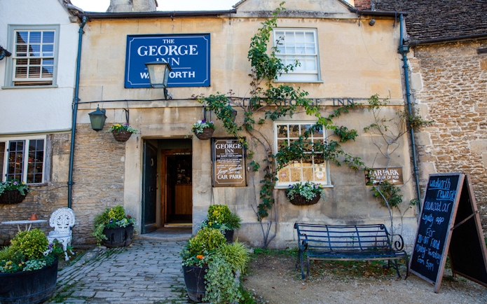 The George Inn entrance with hanging plants, Lacock.