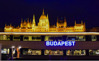 Budapest Parliament illuminated at night during a 90-minute sightseeing cruise.