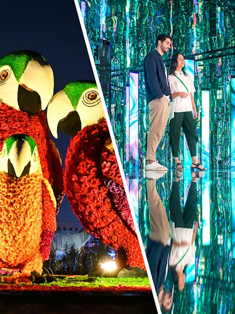 Floral parrot and tiger sculptures at Dubai Garden Glow with visitors in a mirrored room.