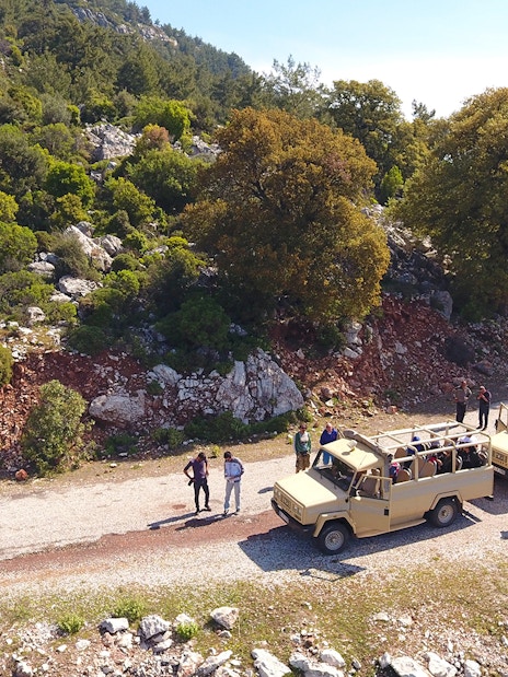 Jeep convoy on a scenic mountain road during Antalya safari tour.