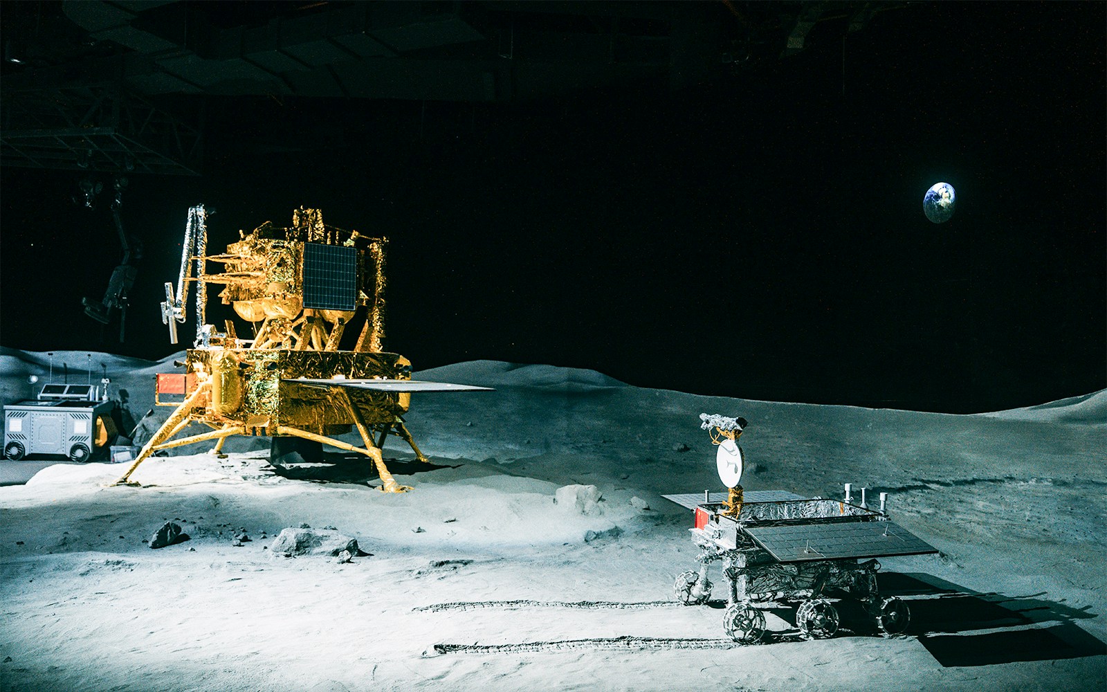 Diorama of space station on the moon, rover and planet earth in the back at the Houston Space Center