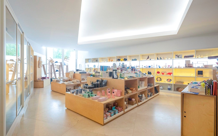 Gift shop interior at Serralves Foundation, Porto, displaying various souvenirs and art items.