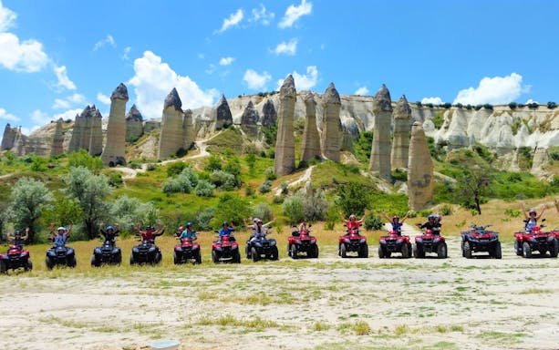 ATV riders exploring Cappadocia's unique rock formations.