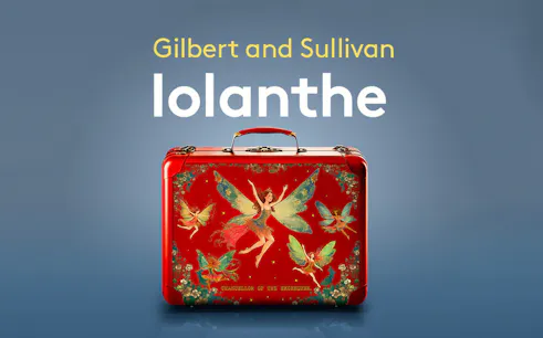Gilbert and Sullivan's Iolanthe poster with fairies on a red suitcase.