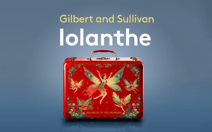 Gilbert and Sullivan's Iolanthe poster with fairies on a red suitcase.