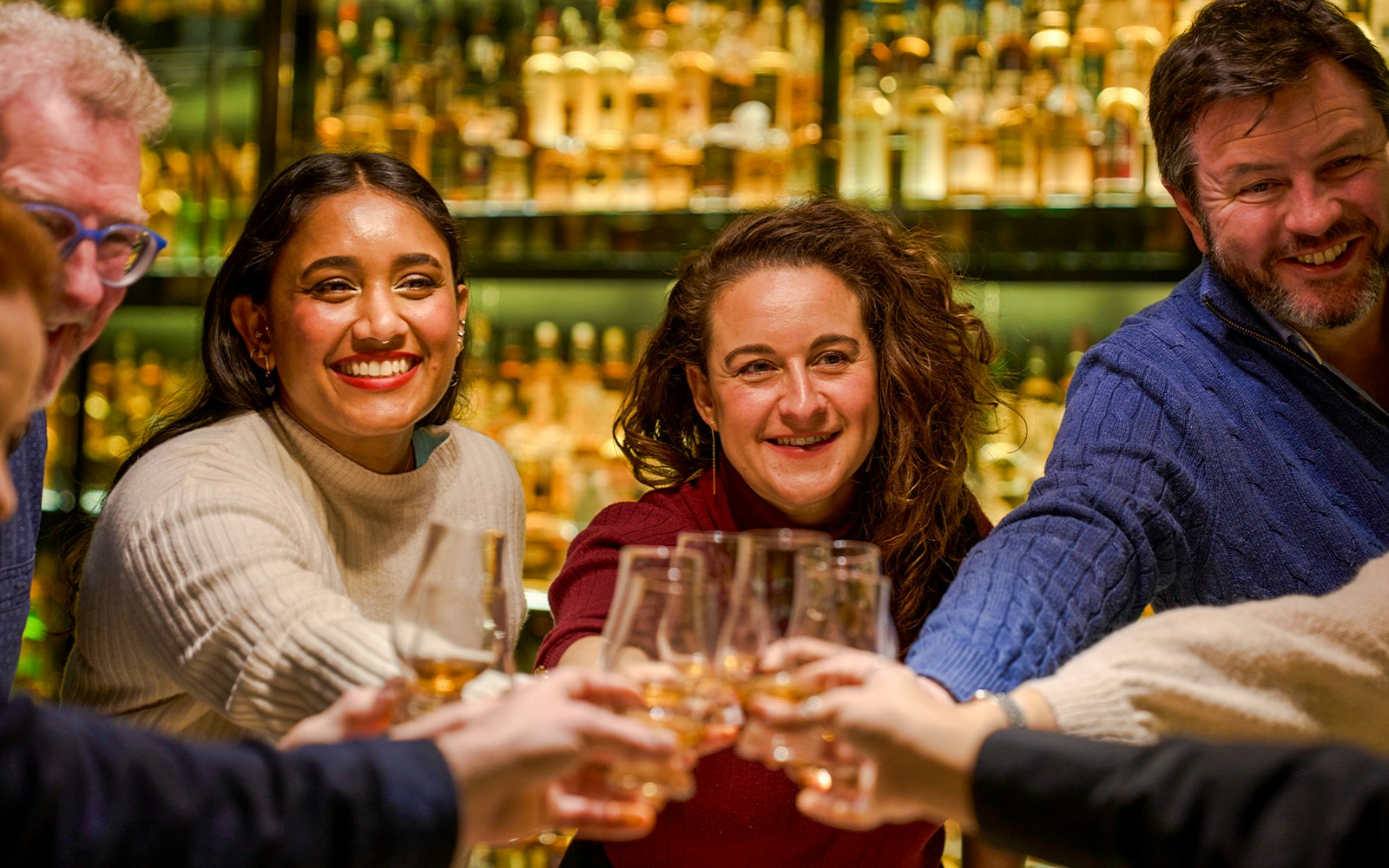 Guests sampling whiskey at the Scotch Whisky Experience in Edinburgh.