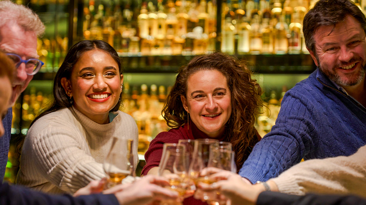 Guests sampling whiskey at the Scotch Whisky Experience in Edinburgh.