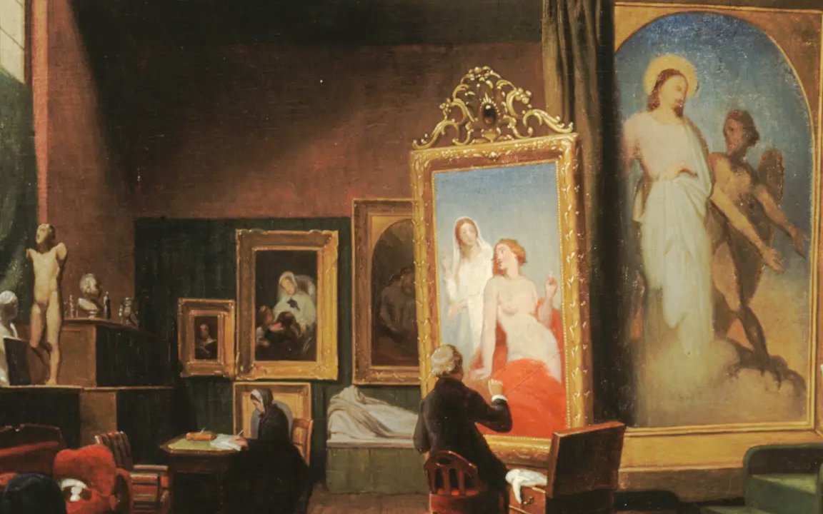 Artist painting in a studio with framed artworks at Musée de la Vie romantique, Paris, France.