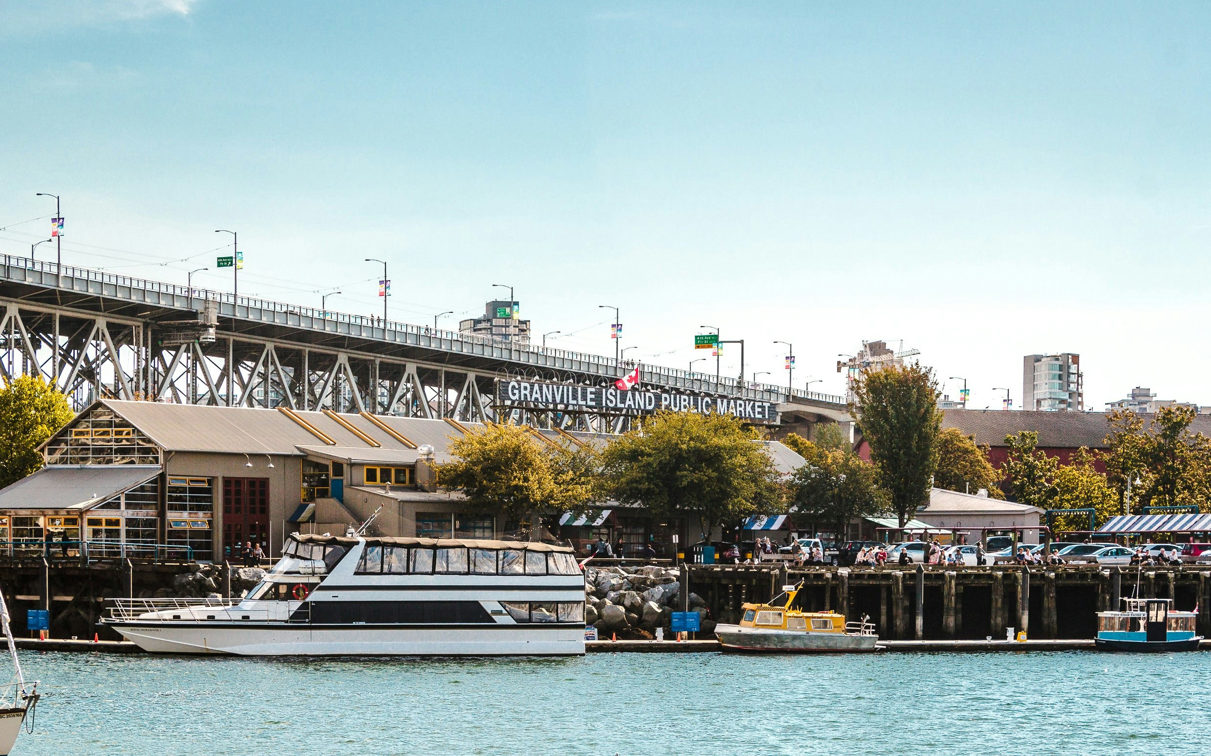 Granville Island Public Market with boats docked in Vancouver, Canada.