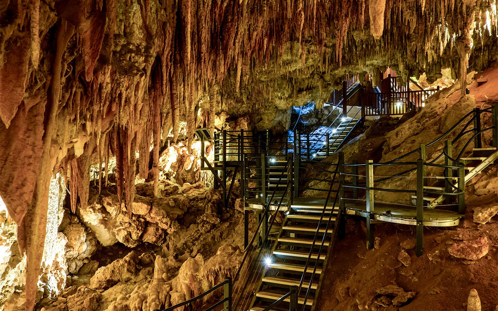 Stalactites and walkways inside Margaret River Cave, Australia.