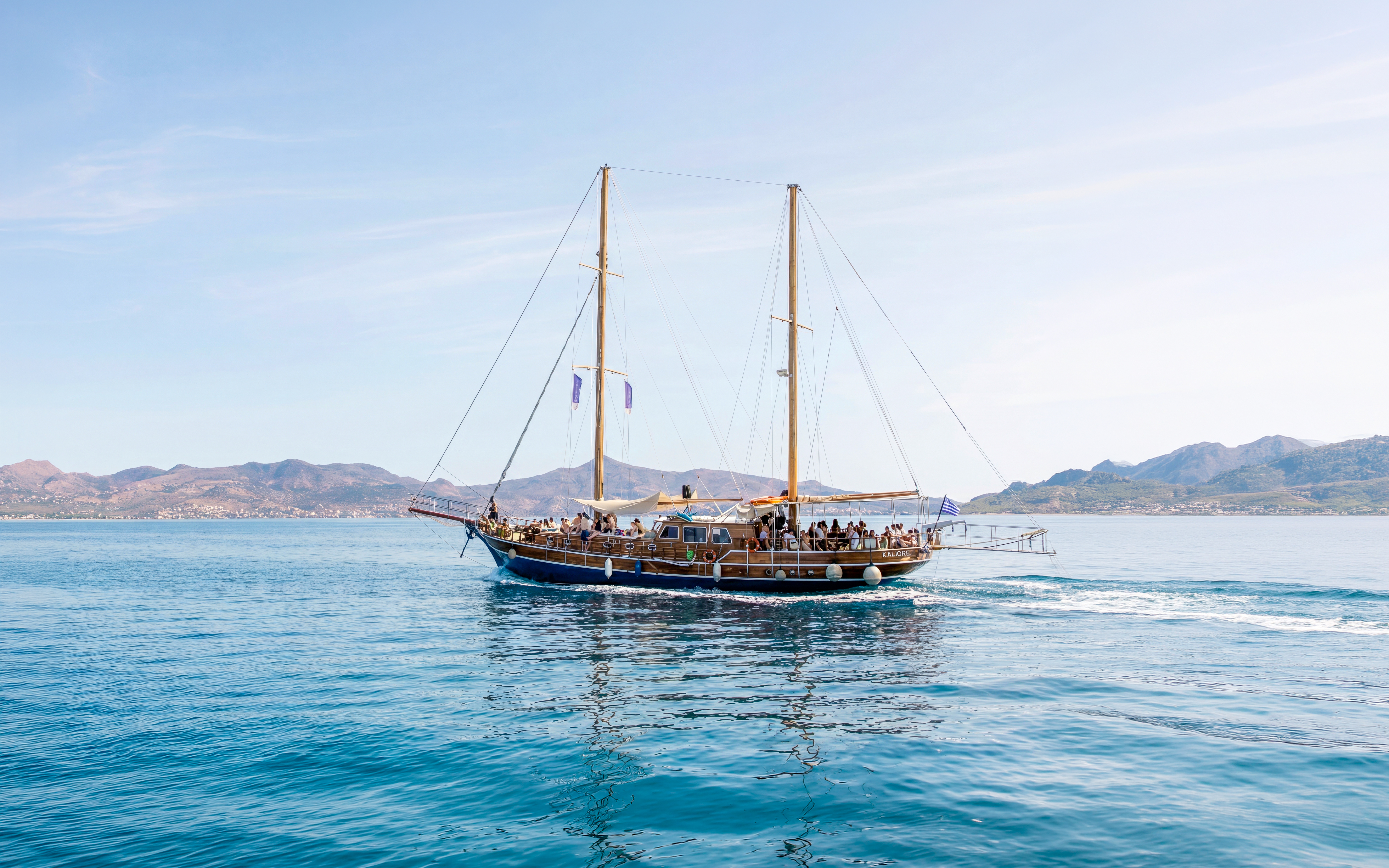 Sailing boat on a day cruise from Athens to Agistri, Moni, and Aegina with passengers on board.
