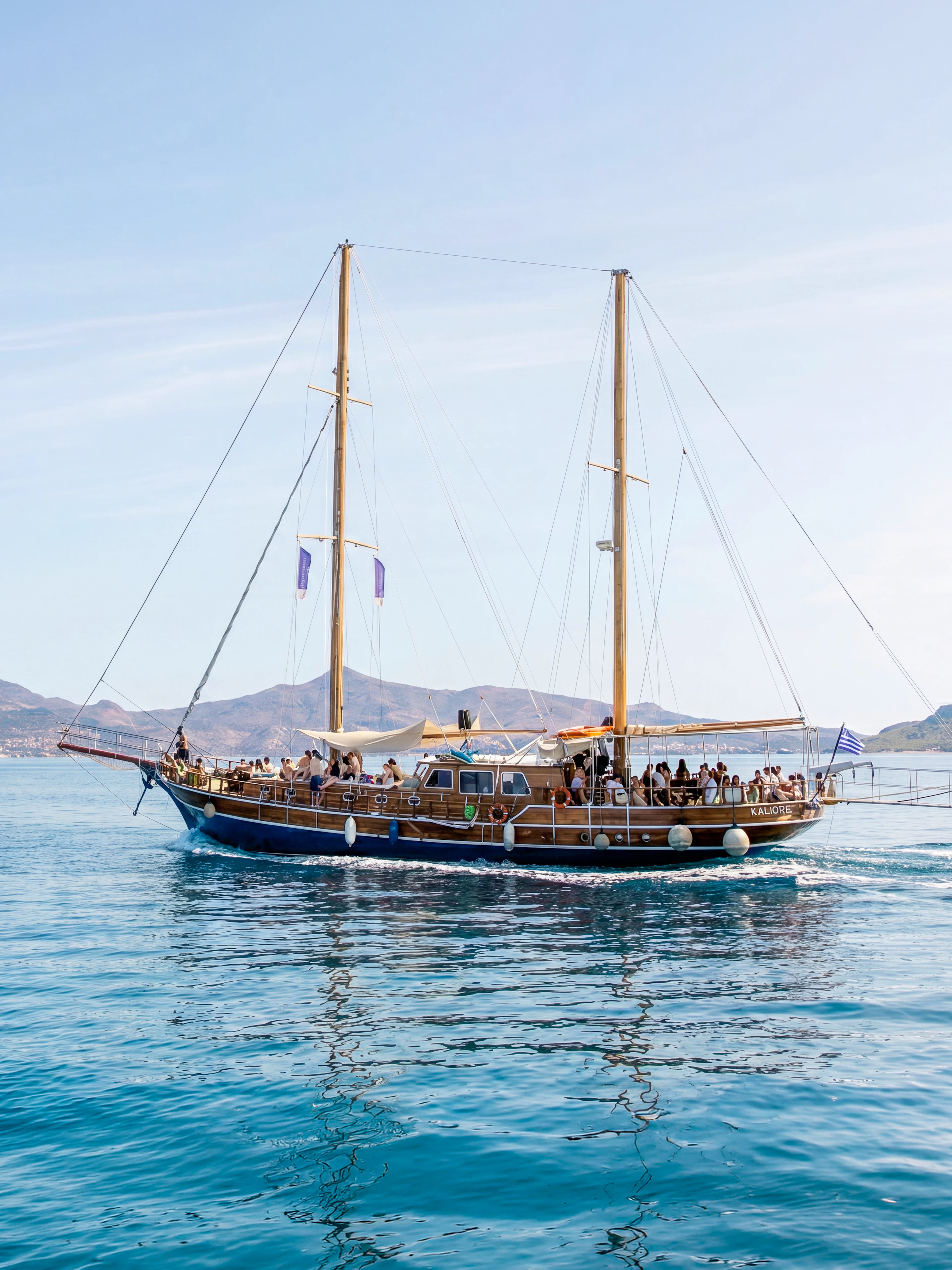 Sailing boat on a day cruise from Athens to Agistri, Moni, and Aegina with passengers on board.