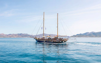 Sailing boat on a day cruise from Athens to Agistri, Moni, and Aegina with passengers on board.