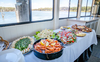 Lunch buffet with seafood, salads, and meats on a Murray River cruise.