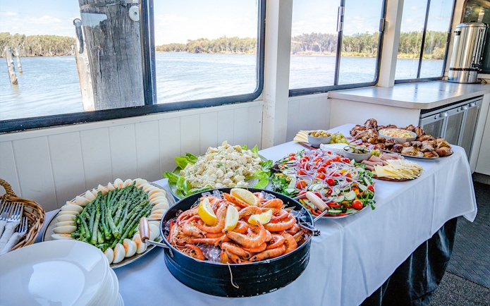 Lunch buffet with seafood, salads, and meats on a Murray River cruise.