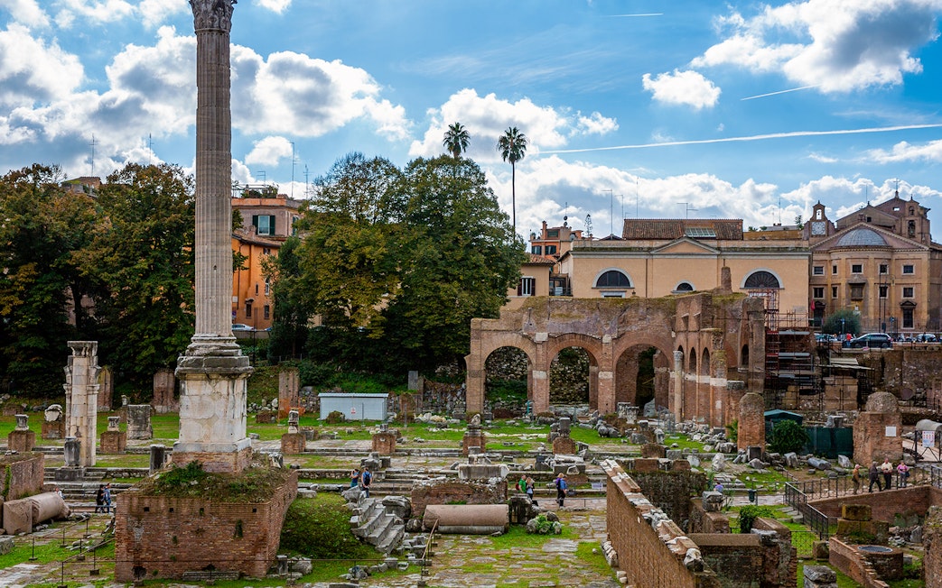 Largo di Torre Argentina ruins with ancient columns and arches in Rome, Italy.