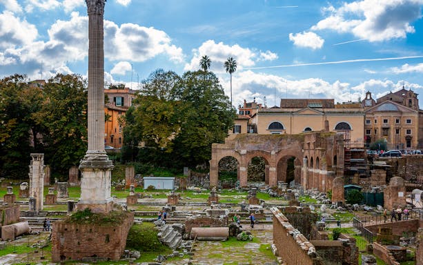 Largo di Torre Argentina ruins with ancient columns and arches in Rome, Italy.