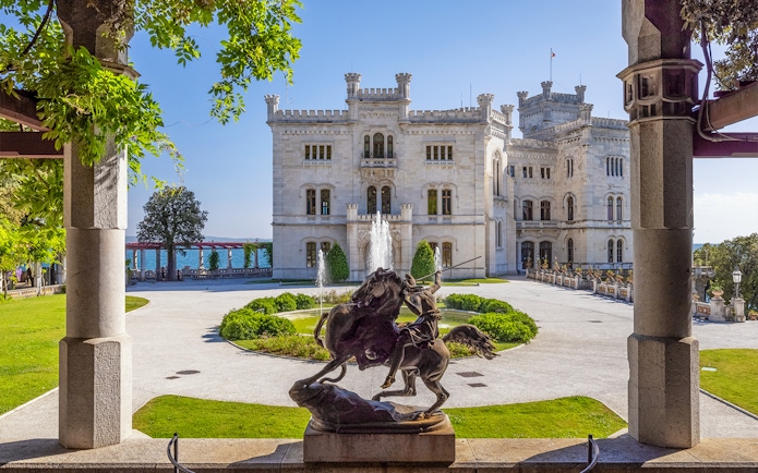 Miramare Castle courtyard with warrior statue in Trieste, Italy.
