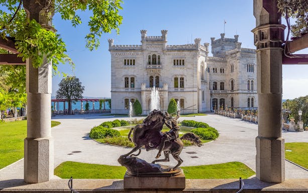 Miramare Castle courtyard with warrior statue in Trieste, Italy.