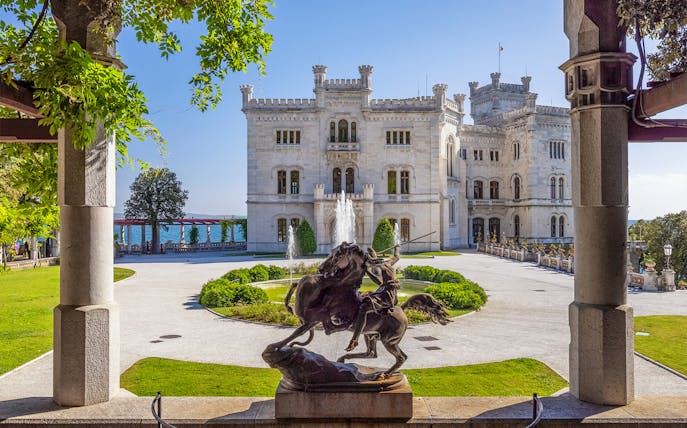 Miramare Castle courtyard with warrior statue in Trieste, Italy.