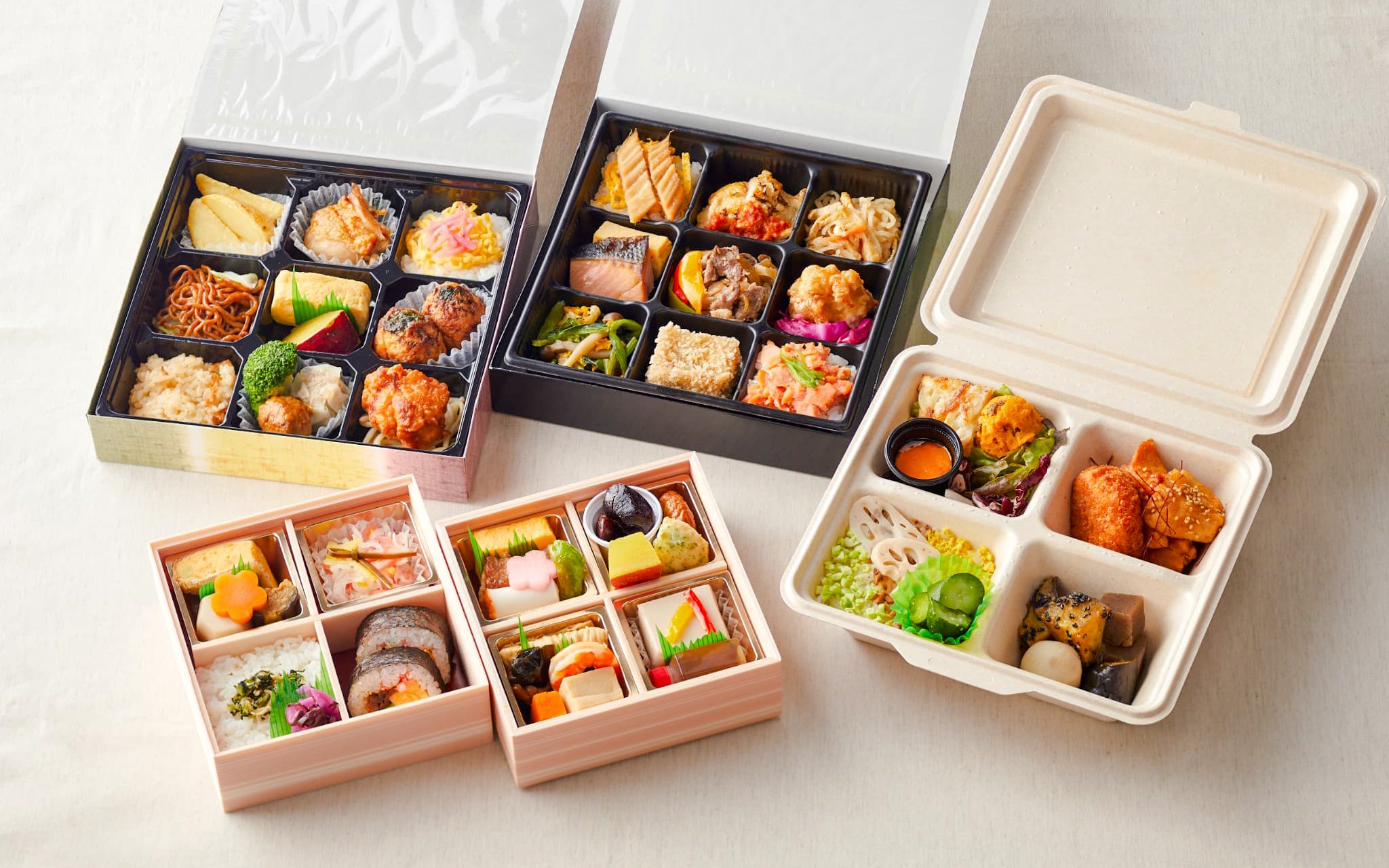 Assorted Japanese bento boxes with various dishes, related to Chanko Hot Pot tour.