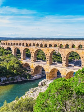 Pont du Gard ancient Roman aqueduct bridge spanning a river in southern France.