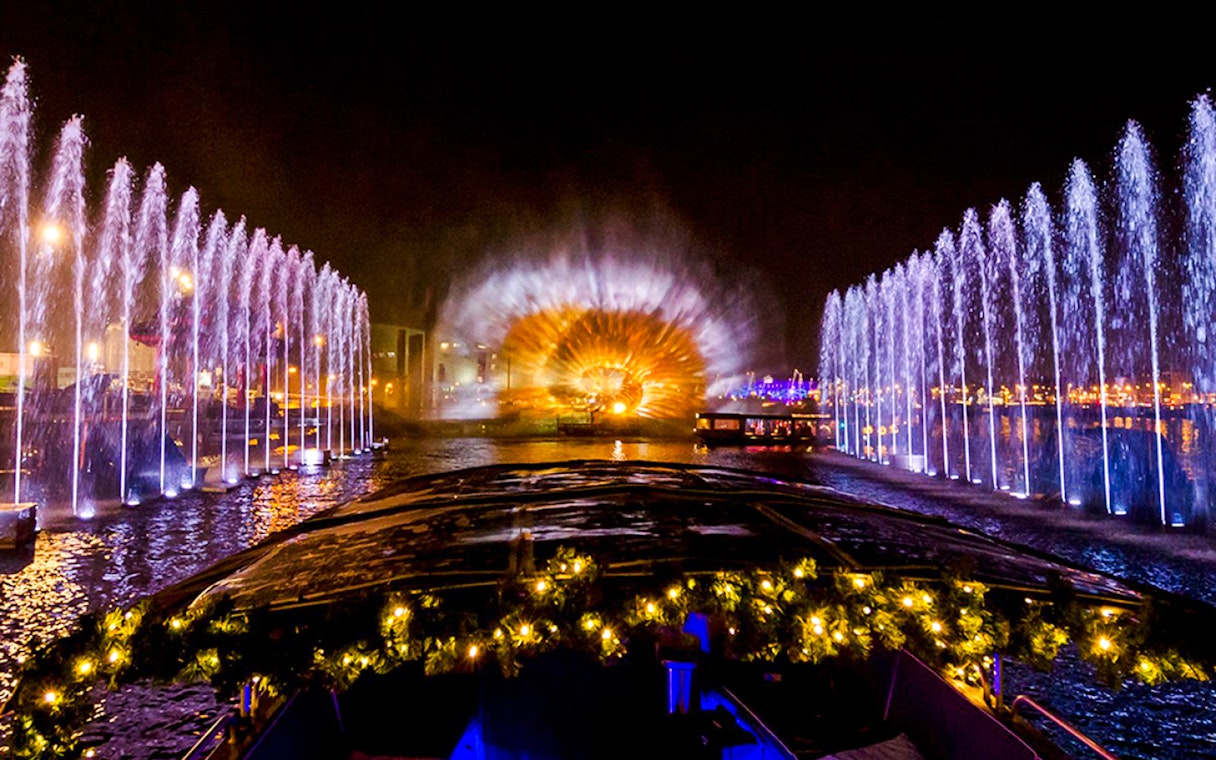 Amsterdam Light Festival cruise with illuminated fountains and light display.