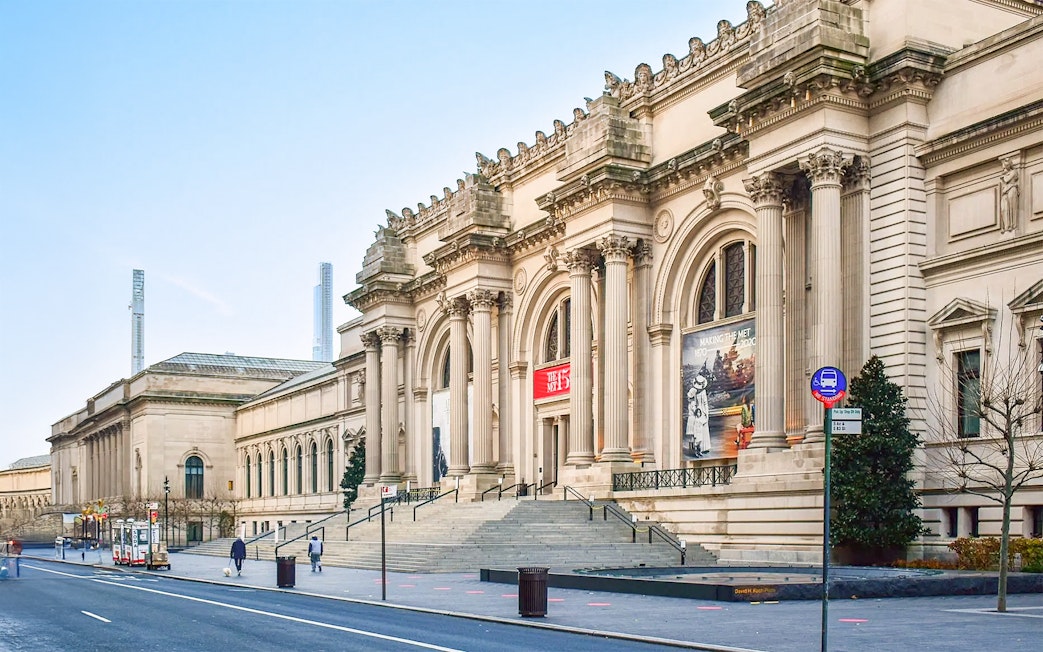 The Met Museum entrance with grand columns, New York City, featured in pre-orientation tour.