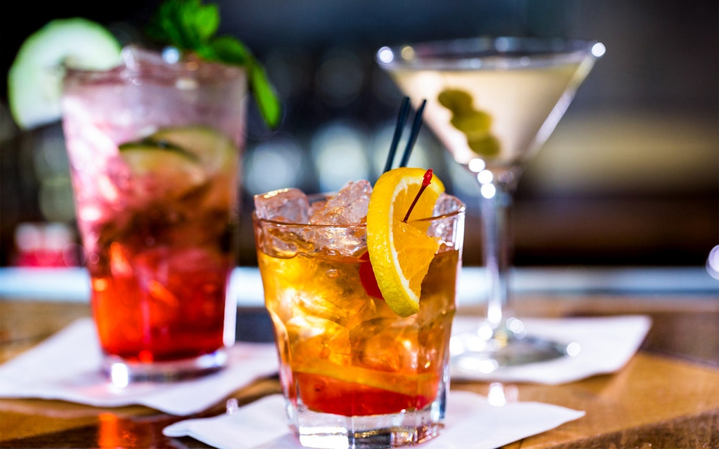 Cocktails with garnishes.