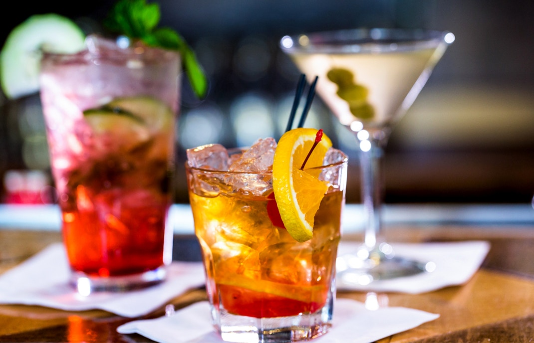 Cocktails with garnishes.