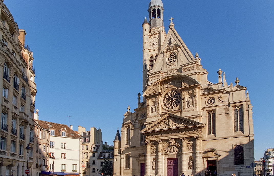 Saint-Étienne-du-Mont church facade in Paris with intricate architectural details.