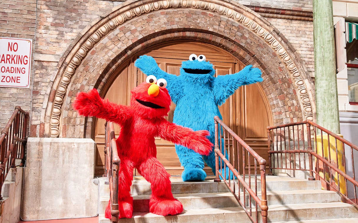 Sesame Street characters at Universal Studios Singapore entrance.