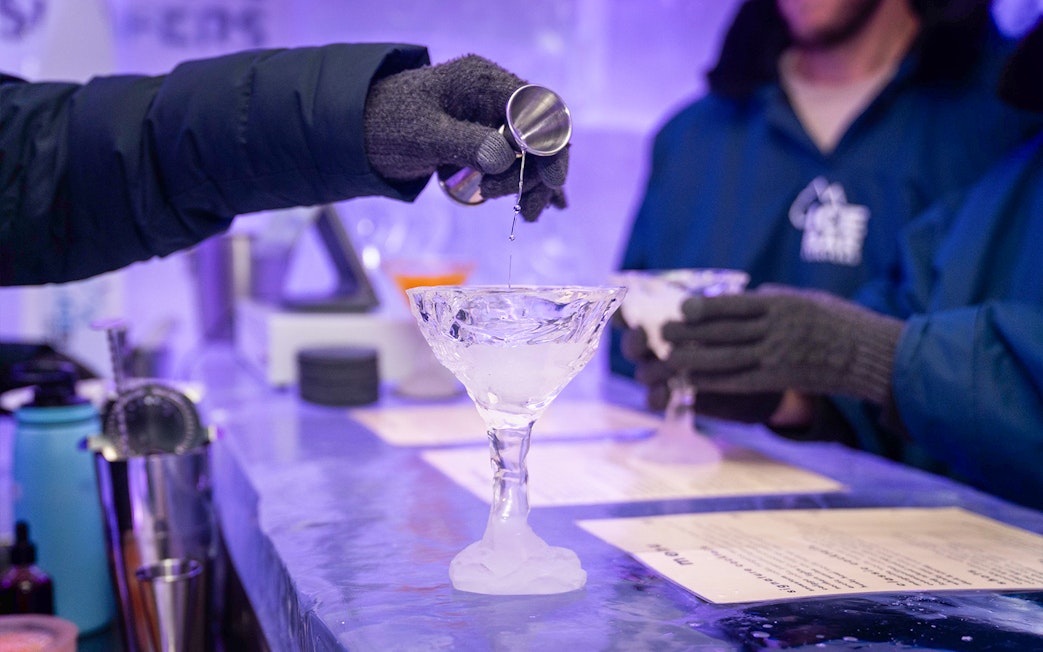 Pouring drink into ice glass at IceBar Surfers Paradise.