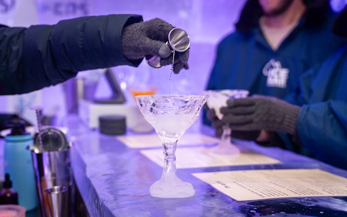 Pouring drink into ice glass at IceBar Surfers Paradise.