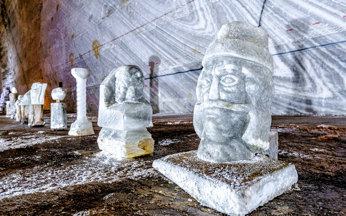 Sculptures carved from salt inside Slanic Salt Mine, Romania.