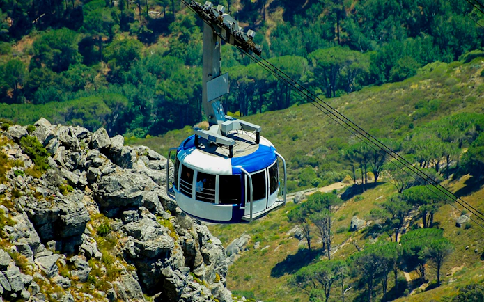 Cable car ascending Table Mountain in Cape Town, South Africa.