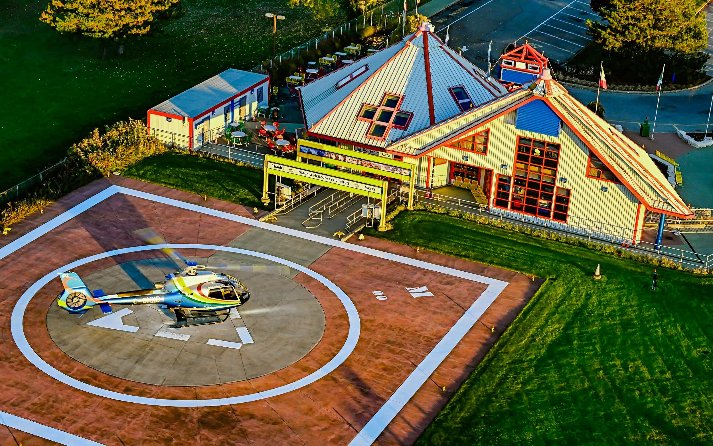 Helicopter on helipad at Niagara Falls Canada tour facility.