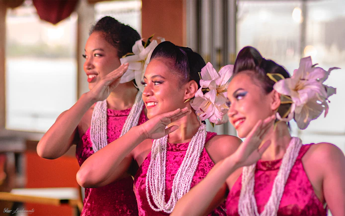 Hula dancers performing on the Star Independence Day Cruise, Hawaii.