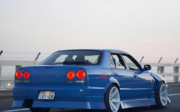 Blue Nissan Skyline 34 at Daikoku PA car meeting, Japan.