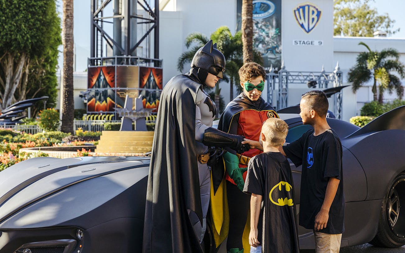 Batman and Robin greet children at Warner Bros Movie World, Gold Coast.